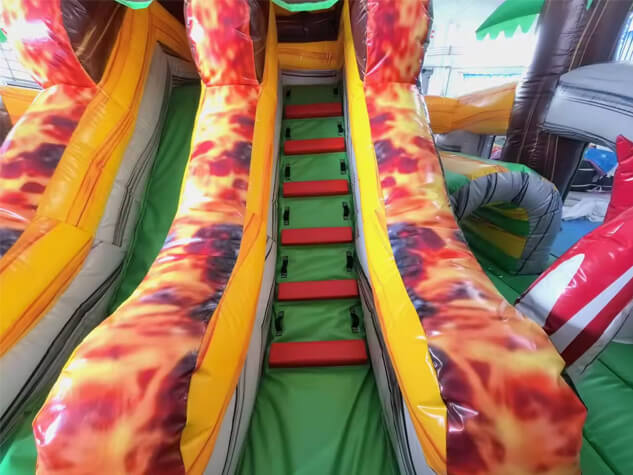Château gonflable dinosaure toboggan intérieur